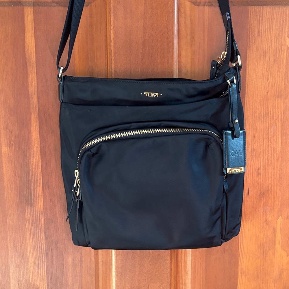 Tumi Black Shoulder Bag with Gold Accents